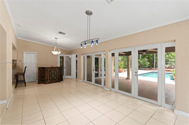 1090 Meadowlark Ave, Miami Springs, FL 33166 - spare room with ornamental molding, french doors, and light tile patterned floors