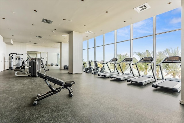 2900 NE 7th Ave Unit 3605, Miami, FL 33137 - workout area with a wall of windows and a towering ceiling