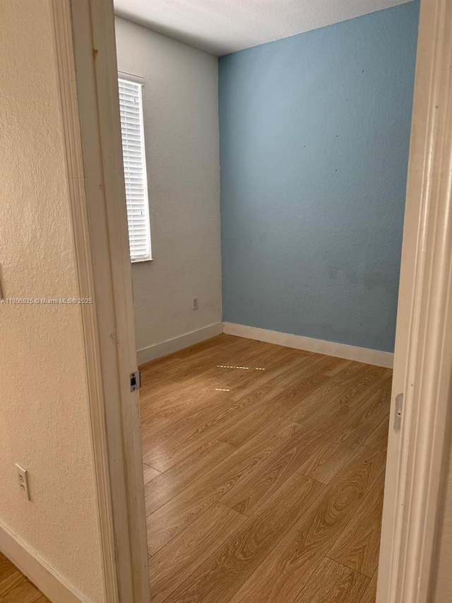 6251 SW 164th Path, Miami, FL 33193 - empty room with wood finished floors and baseboards