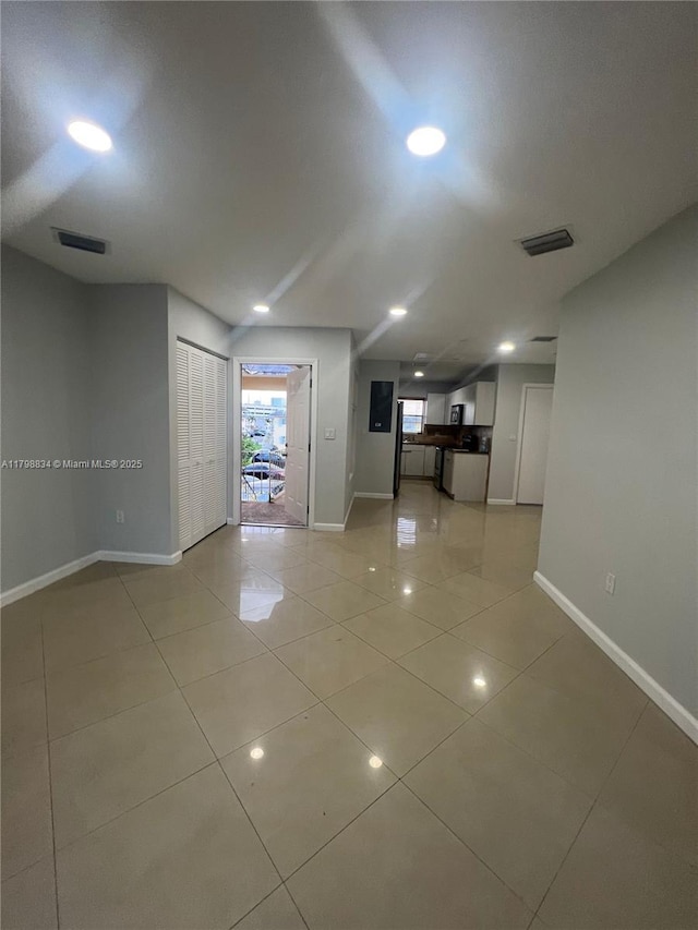 7368 SW 82nd St Unit E215, Miami, FL 33143 - empty room with baseboards, light tile patterned flooring, and recessed lighting