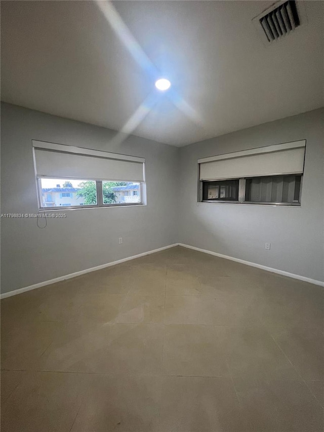 7368 SW 82nd St Unit E215, Miami, FL 33143 - unfurnished room featuring baseboards