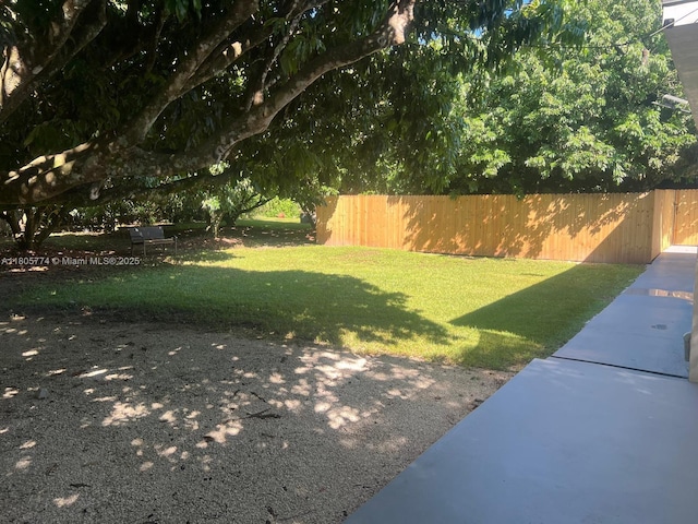 15225 SW 235th St, Homestead, FL 33032 - view of yard with a patio