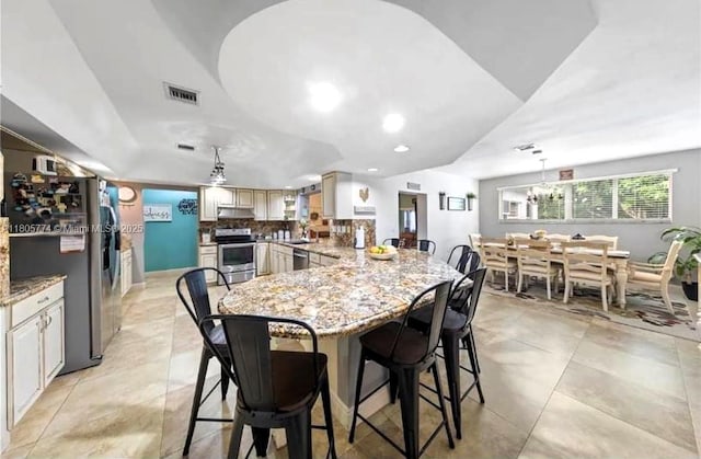 15225 SW 235th St, Homestead, FL 33032 - dining space with recessed lighting and light tile patterned flooring