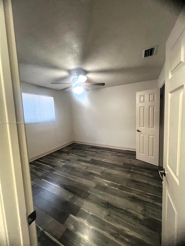 15225 SW 235th St, Homestead, FL 33032 - spare room featuring ceiling fan, dark wood finished floors, and baseboards