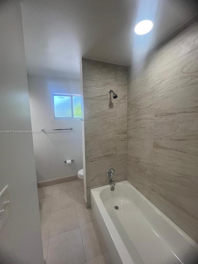 15225 SW 235th St, Homestead, FL 33032 - bathroom featuring toilet, tile patterned flooring, tub / shower combination, and baseboards