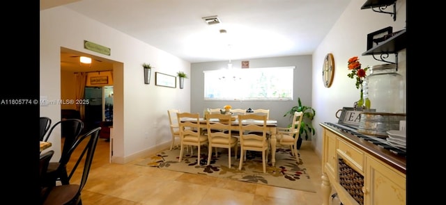 15225 SW 235th St, Homestead, FL 33032 - dining space featuring light tile patterned floors and baseboards