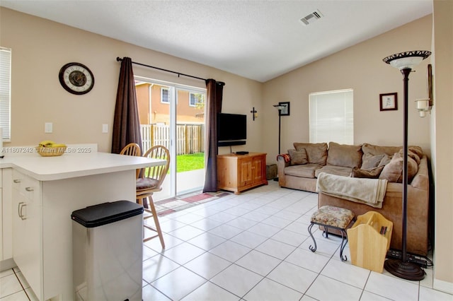 19171 NW 89th Ct, Hialeah, FL 33018 - living area with lofted ceiling and light tile patterned flooring