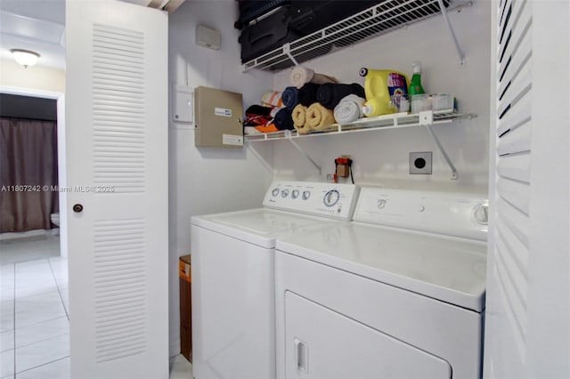 19171 NW 89th Ct, Hialeah, FL 33018 - laundry room featuring washer and clothes dryer and light tile patterned flooring