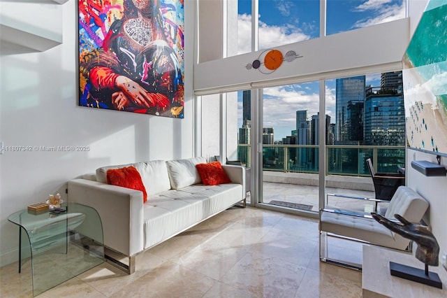 41 SE 5th St Unit 2008, Miami, FL 33131 - living room with a high ceiling and a view of skyline