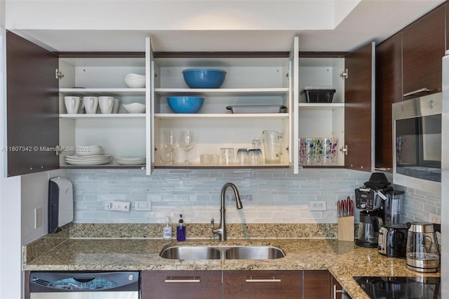 41 SE 5th St Unit 2008, Miami, FL 33131 - kitchen featuring a sink, appliances with stainless steel finishes, dark brown cabinetry, and tasteful backsplash