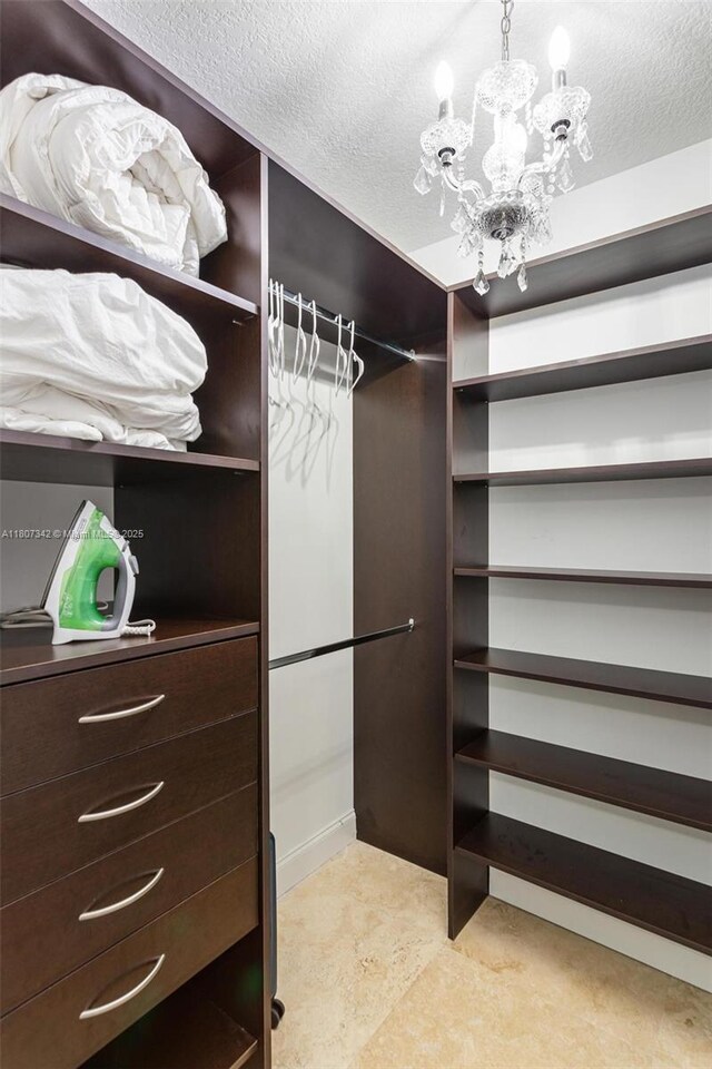 41 SE 5th St Unit 2008, Miami, FL 33131 - walk in closet with a chandelier