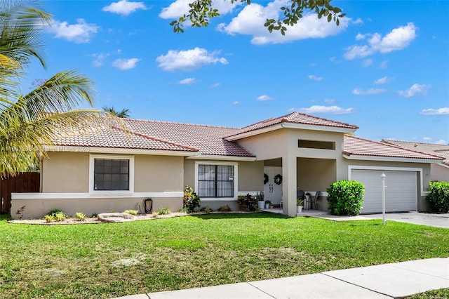 15828 S Ashby Field Rd S, Davie, FL 33331 - view of front of property with stucco siding, a garage, concrete driveway, and a tile roof