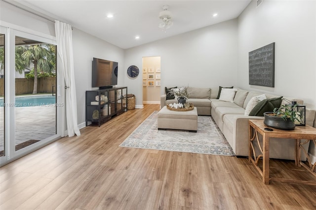 15828 S Ashby Field Rd S, Davie, FL 33331 - living room with light wood-type flooring, recessed lighting, lofted ceiling, and baseboards