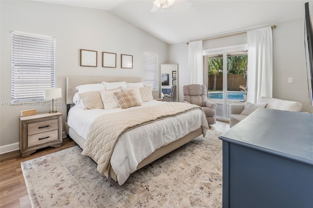 15828 S Ashby Field Rd S, Davie, FL 33331 - bedroom featuring access to outside, light wood-type flooring, lofted ceiling, baseboards, and ceiling fan