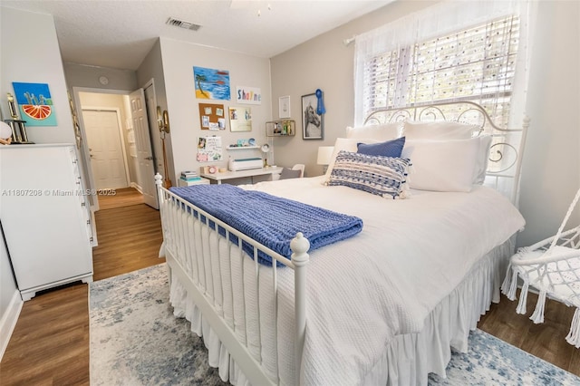 15828 S Ashby Field Rd S, Davie, FL 33331 - bedroom with wood finished floors and baseboards