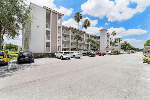 6080 Huntwick Ter Unit 202, Delray Beach, FL 33484 - view of apartment building / complex with uncovered parking