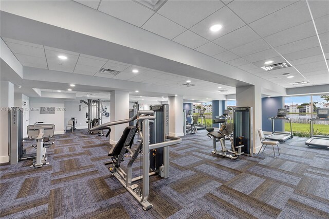 6080 Huntwick Ter Unit 202, Delray Beach, FL 33484 - exercise room with carpet floors, baseboards, and a drop ceiling