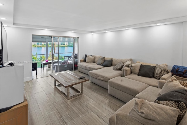 141 SE 3rd Ave Unit 101, Dania Beach, FL 33004 - living room featuring recessed lighting