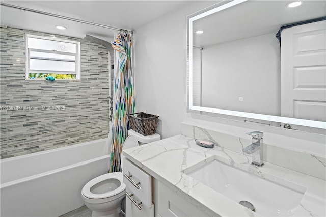 141 SE 3rd Ave Unit 101, Dania Beach, FL 33004 - bathroom featuring toilet, shower / tub combo with curtain, recessed lighting, and vanity