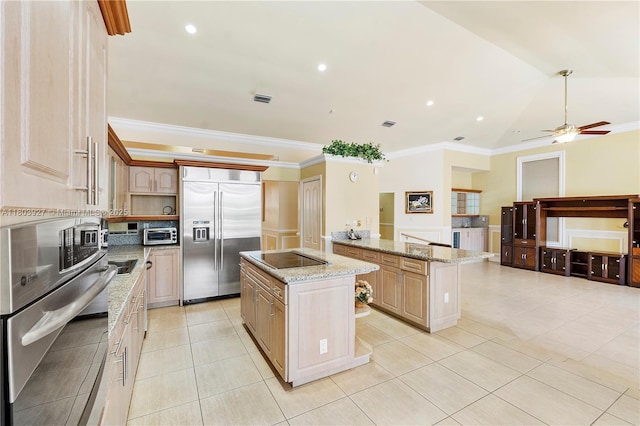 8281 SW 84th Ter, Miami, FL 33143 - kitchen with built in fridge, a center island, light tile patterned floors, crown molding, and ceiling fan