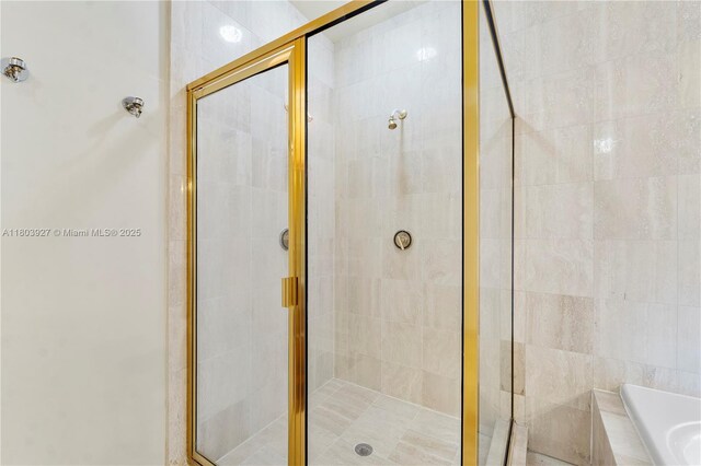 8281 SW 84th Ter, Miami, FL 33143 - bathroom featuring a bath and a stall shower