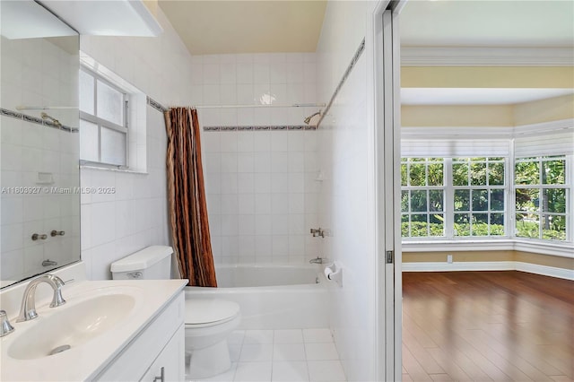 8281 SW 84th Ter, Miami, FL 33143 - full bathroom featuring vanity, shower / tub combo, healthy amount of natural light, and wood finished floors