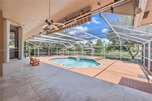 8281 SW 84th Ter, Miami, FL 33143 - view of pool featuring a patio area, a pool with connected hot tub, a lanai, and a ceiling fan