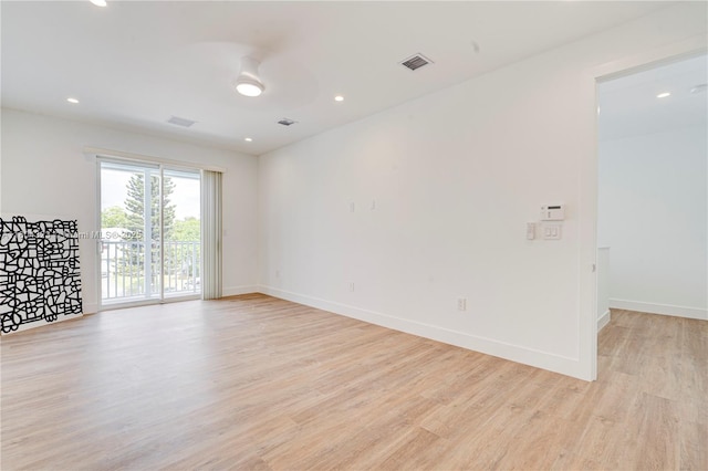 1805 NW 22nd Ct, Miami, FL 33125 - unfurnished room featuring light wood finished floors, baseboards, and recessed lighting