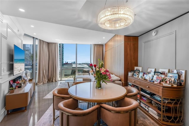 851 NE 1st Ave Unit 1409, Miami, FL 33132 - dining area featuring expansive windows and a chandelier