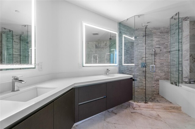 851 NE 1st Ave Unit 1409, Miami, FL 33132 - bathroom featuring a shower stall, marble look tiles, double vanity, and a bathtub