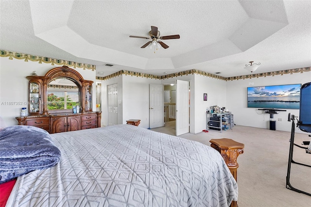 17933 SW 33rd Ct, Miramar, FL 33029 - carpeted bedroom featuring a textured ceiling, a raised ceiling, and ceiling fan