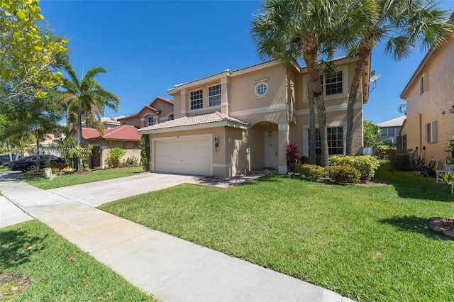 17933 SW 33rd Ct, Miramar, FL 33029 - mediterranean / spanish-style home with stucco siding, driveway, a front lawn, a tiled roof, and an attached garage