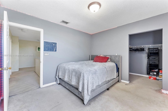 17933 SW 33rd Ct, Miramar, FL 33029 - carpeted bedroom with a closet, baseboards, and a textured ceiling