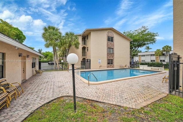 3361 NW 85th Ave Unit 305, Coral Springs, FL 33065 - community pool with a patio