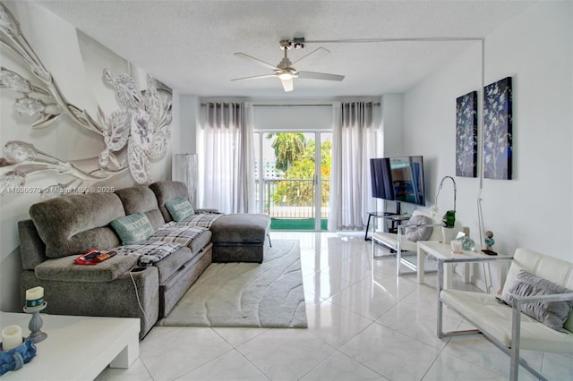 1965 S Ocean Dr Unit Mq, Hallandale Beach, FL 33009 - living area featuring ceiling fan, a textured ceiling, and light tile patterned floors