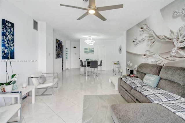 1965 S Ocean Dr Unit Mq, Hallandale Beach, FL 33009 - living room featuring ceiling fan, tile patterned floors, and a chandelier