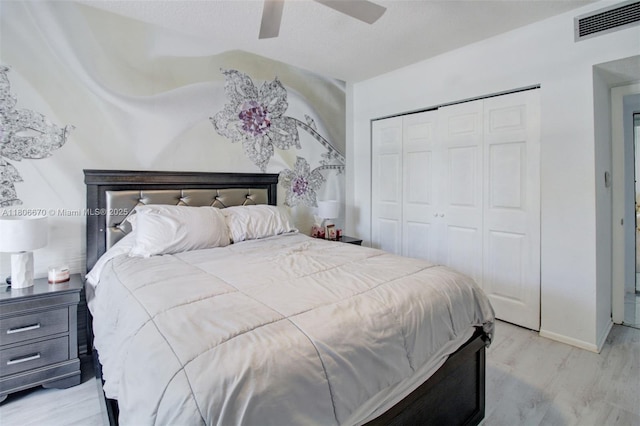 1965 S Ocean Dr Unit Mq, Hallandale Beach, FL 33009 - bedroom with a closet, wood finished floors, a ceiling fan, and baseboards