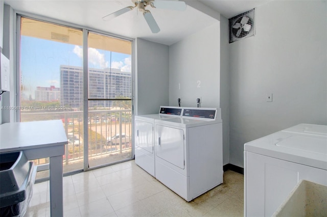 1965 S Ocean Dr Unit Mq, Hallandale Beach, FL 33009 - community laundry featuring washer and dryer, ceiling fan, and a view of city
