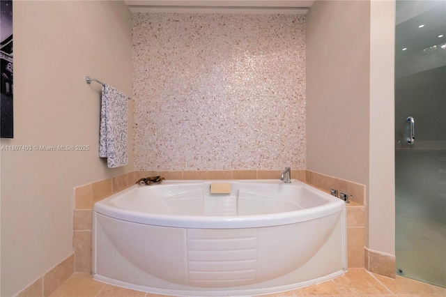 18201 Collins Ave Unit 3909, Sunny Isles Beach, FL 33160 - bathroom with a bath and tile patterned flooring
