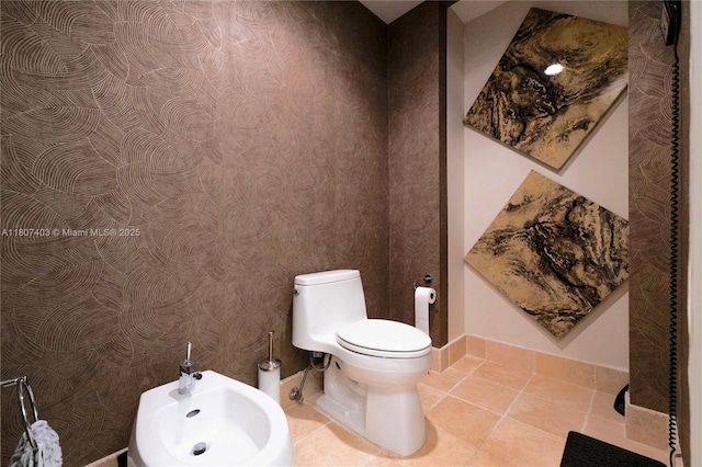 18201 Collins Ave Unit 3909, Sunny Isles Beach, FL 33160 - half bath with a bidet, toilet, tile patterned floors, and baseboards