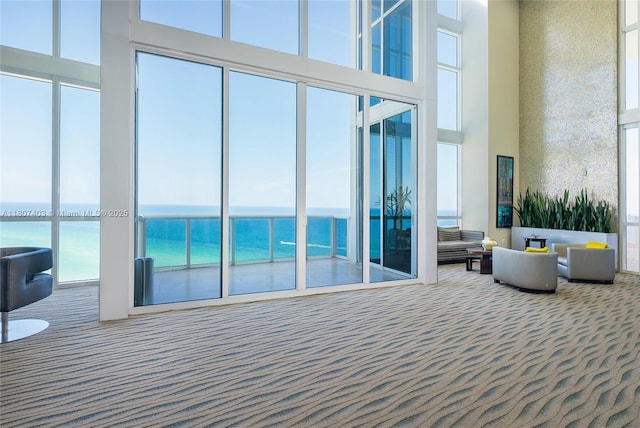 18201 Collins Ave Unit 3909, Sunny Isles Beach, FL 33160 - community lobby featuring a towering ceiling and a water view