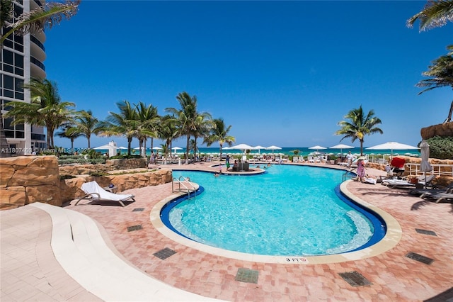 18201 Collins Ave Unit 3909, Sunny Isles Beach, FL 33160 - community pool featuring a patio area