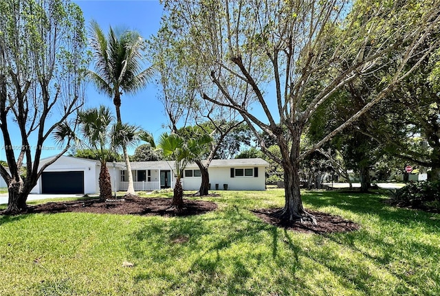 8890 SW 155th Ter, Palmetto Bay, FL 33157 - ranch-style home featuring an attached garage and a front lawn