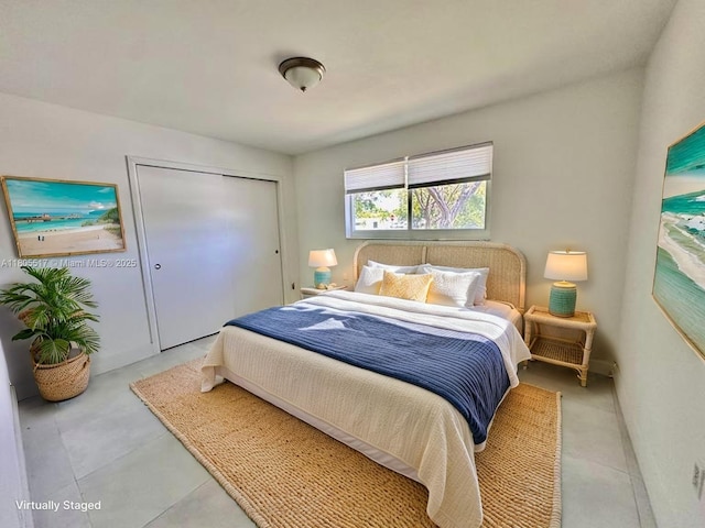 8890 SW 155th Ter, Palmetto Bay, FL 33157 - bedroom featuring a closet and light tile patterned floors