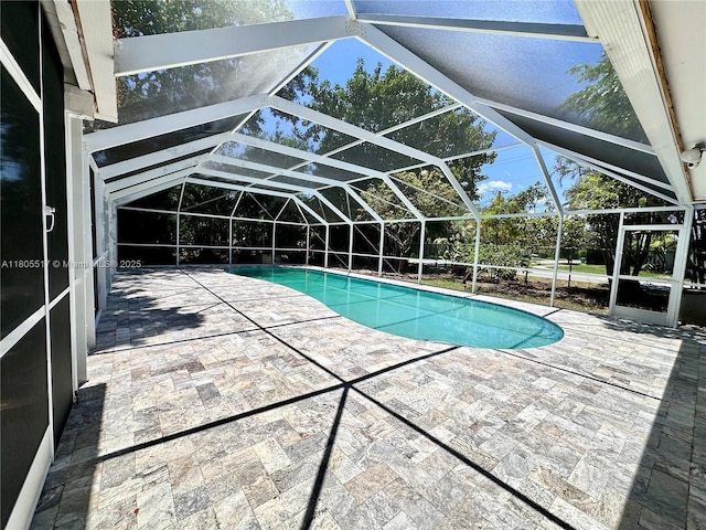 8890 SW 155th Ter, Palmetto Bay, FL 33157 - swimming pool featuring a patio and glass enclosure