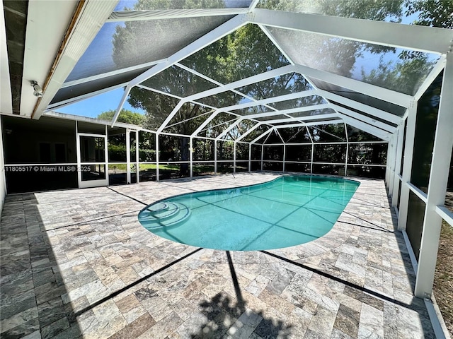 8890 SW 155th Ter, Palmetto Bay, FL 33157 - outdoor pool with a patio and a lanai