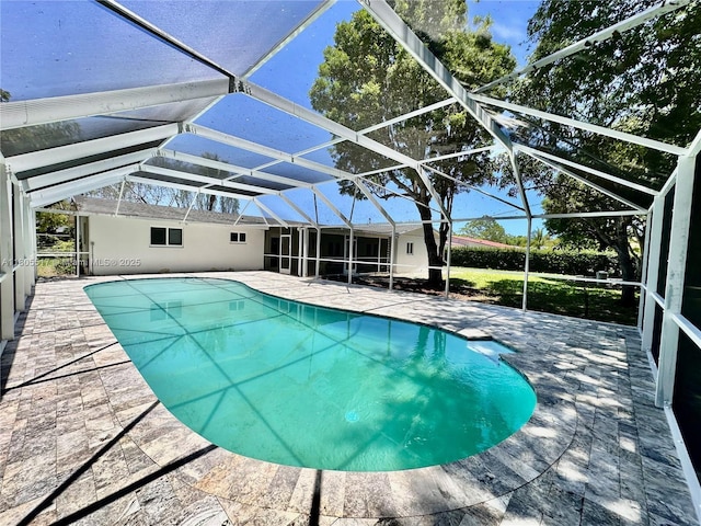 8890 SW 155th Ter, Palmetto Bay, FL 33157 - outdoor pool featuring a patio area and glass enclosure