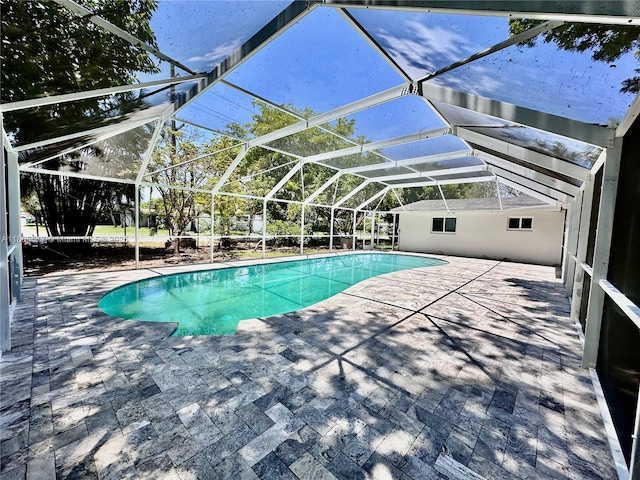 8890 SW 155th Ter, Palmetto Bay, FL 33157 - outdoor pool featuring a patio and glass enclosure