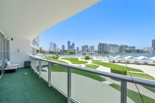 900 Bay Dr Unit 210, Miami Beach, FL 33141 - balcony featuring a view of skyline and a water view