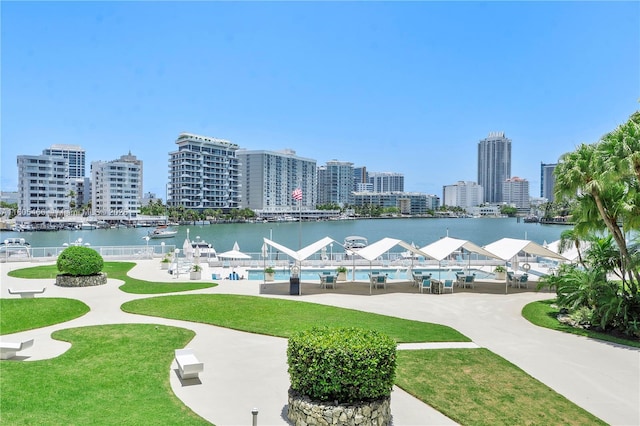 900 Bay Dr Unit 210, Miami Beach, FL 33141 - view of property's community featuring a water view, a view of skyline, and a yard